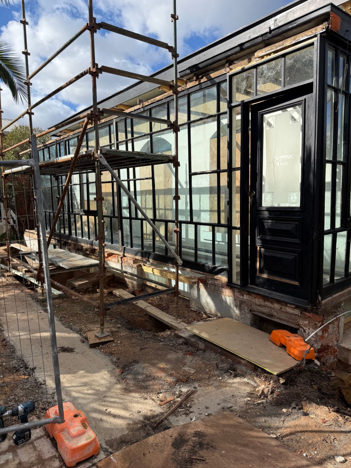Verandah extension before, under construction